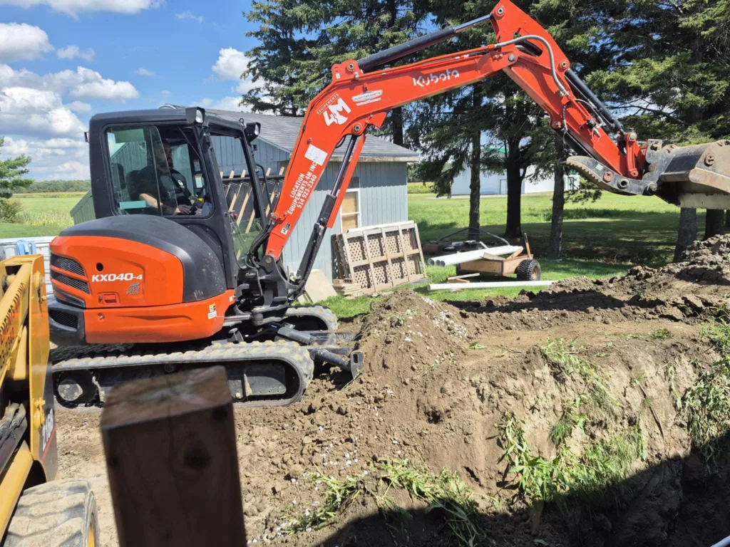 Excavation et terrassement pour fondations, drains et piscines résidentielles